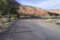 USA Utah: Mountain Grass and Asphalt Road