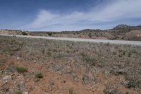 USA Utah Road Through Asphalt Desert Landscape