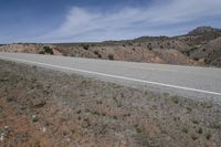 USA Utah Road Through Asphalt Desert Landscape