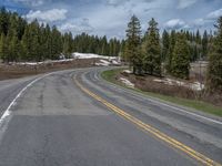 USA Winter Scene: Road, Snow, and Trees