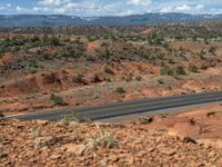 Utah's Aerial View: Road Cutting Through Stunning Landscape