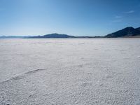 this is a vast expanse of salt on top of a mountain peak and looking across the horizon