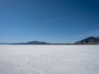 this is a vast expanse of salt on top of a mountain peak and looking across the horizon