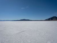 this is a vast expanse of salt on top of a mountain peak and looking across the horizon