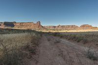 Utah Dawn: Road Through the Desert Sand Landscape