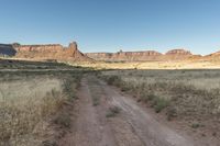 Utah Dawn: Road Through the Desert Sand Landscape