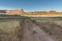 Utah Dawn: Road Through the Desert Sand Landscape