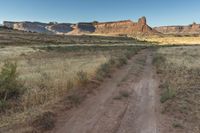 Utah Dawn: Road Through the Desert Sand Landscape