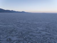 Utah Dawn: Rugged Salt Lake City Landscape with Mountains and Clear Sky