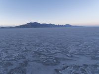 Utah Dawn: Rugged Salt Lake City Landscape with Mountains and Clear Sky