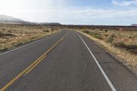 Utah Desert Landscape: Red Rock and Asphalt Road