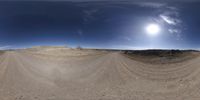 there is a panorama fisheye image taken from a 360 - angle view point at a desert