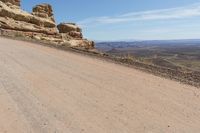 Utah Desert Landscape with Red Rocks and High Cliffs