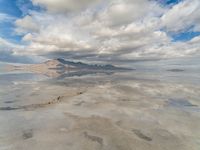 Utah Desert: Salt Lake and Mountain Range with Visible Sun