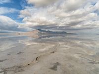 Utah Desert: Salt Lake and Mountain Range with Visible Sun