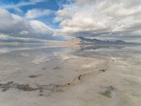 Utah Desert: Salt Lake and Mountain Range with Visible Sun