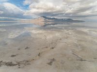 Utah Desert: Salt Lake and Mountain Range with Visible Sun