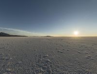 the sun is setting on a sunny day in the desert in wyoming on february 10