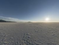 the sun is setting on a sunny day in the desert in wyoming on february 10