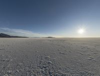 the sun is setting on a sunny day in the desert in wyoming on february 10