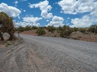 Utah's Gravel Street: Clear Skies Above the Rugged Terrain