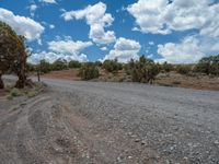 Utah's Gravel Street: Clear Skies Above the Rugged Terrain