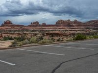 Utah Landscape: Asphalt Road Through Canyons and Clouds