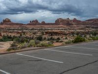 Utah Landscape: Asphalt Road Through Canyons and Clouds