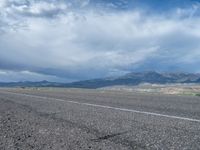 Utah Landscape: Asphalt Road with Majestic Mountains