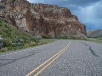 Utah Landscape: Clouds and Mountains Surrounding the Road