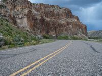 Utah Landscape: Clouds and Mountains Surrounding the Road