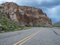 Utah Landscape: Clouds and Mountains Surrounding the Road