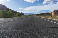 the sun shines brightly on an empty road that is not quite visible as if it was going through the desert