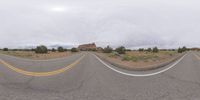 a fisheye lens captures a desert setting and street scene from the outside looking out