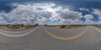 a fisheye lens captures a desert setting and street scene from the outside looking out