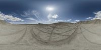 a view from a 3d view point of a sand dune field and clouds in the sky