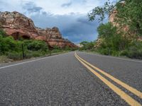 Utah Landscape: A Picturesque Road with Asphalt Under a Clear Sky