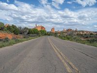 Utah Landscape: A Road Surrounded by Nature and Clouds