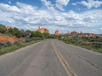 Utah Landscape: A Road Surrounded by Nature and Clouds