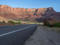 Utah Landscape: Road and Shadow Under Clear Sky