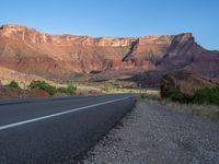 Utah Landscape: Road and Shadow Under Clear Sky