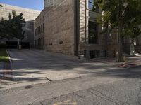 the old building has some red paint on it's sidewalk where the fire hydrant is