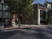 the city street has several buildings and a sign saying don't walk out of the window