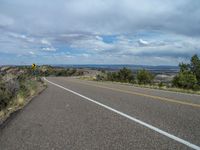 Utah Road: Asphalt, Nature, and Clouds