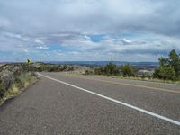 Utah Road: Asphalt, Nature, and Clouds