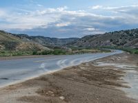 Utah Road: Where Clouds Dance with Nature and Mountains