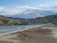 Utah Road: Where Clouds Dance with Nature and Mountains