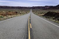 Utah Road in the Desert Landscape with Red Rock