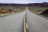 Utah Road in the Desert Landscape with Red Rock