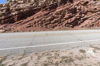 Utah Road through Desert Red Rock Mountains